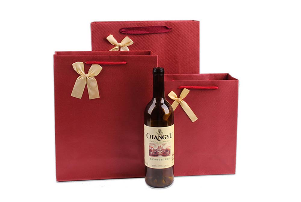 Obtenga productos ecológicos y asequibles: bolsas de papel para vino al por mayor